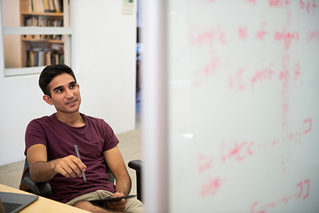 Men looking at equations. Link to Closely Held Business Stock stock.jpg