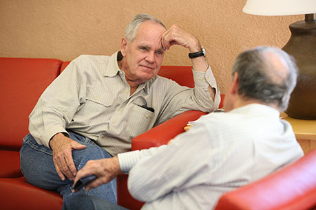 Men talking on a couch. Link to Gifts from Retirement Plans retirement.jpg